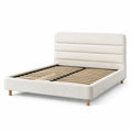 Cama doble beige tapizada con estructura de abedul